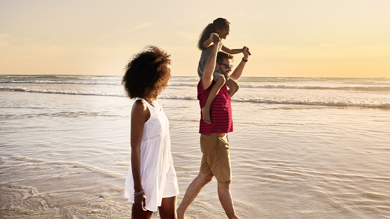A family enjoying a day at the beach